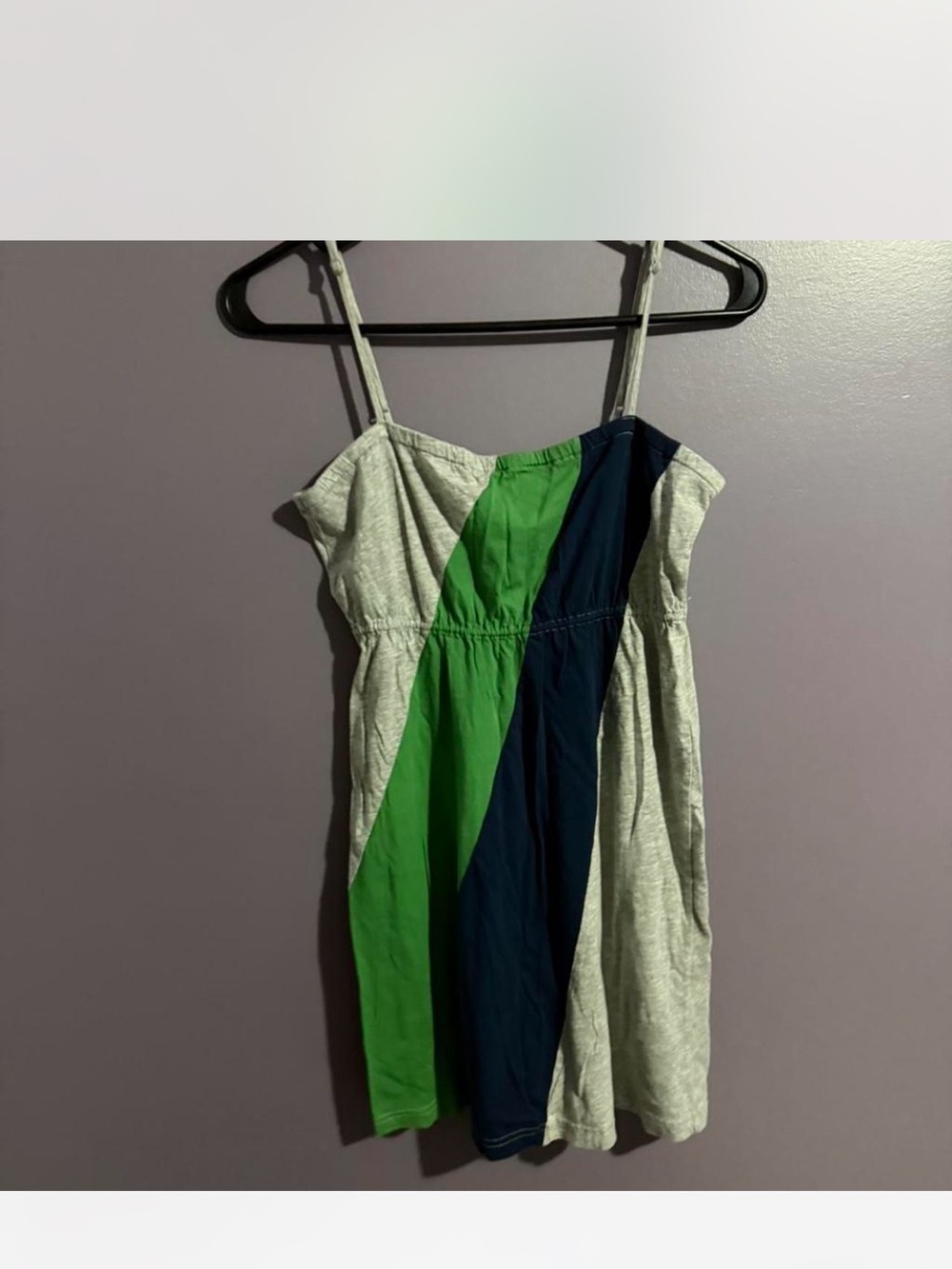 Y2K Heritage cream label with navy script and green tank